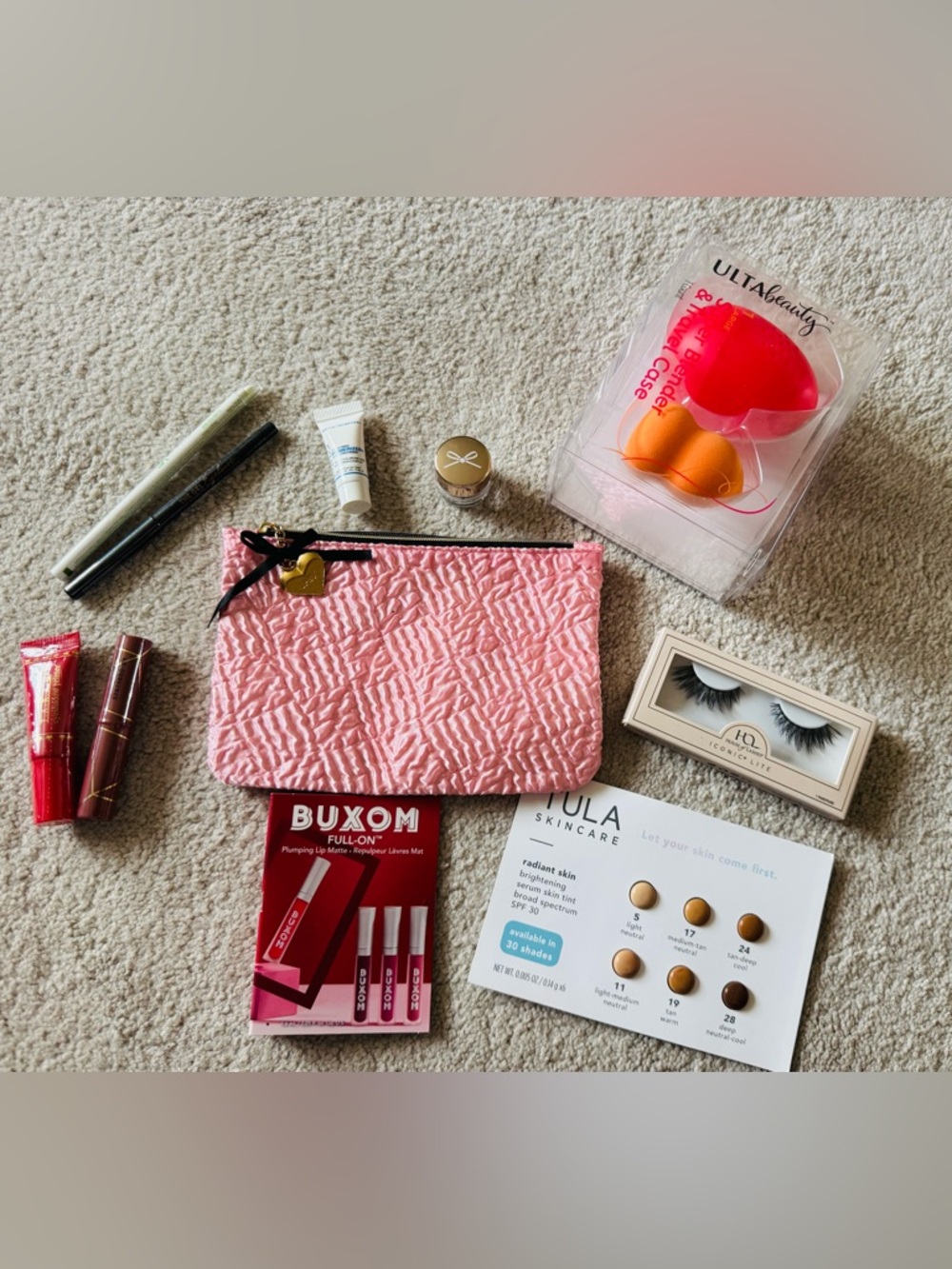 Pink Quilted Makeup Pouch with Assorted Beauty items